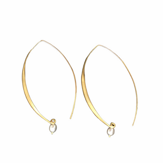 Complete your look with these stunning large open hoop earrings. Their sleek design and lightweight feel make them the perfect accessory for any occasion.  2 half inch hoop with a 3mm pearl drop.