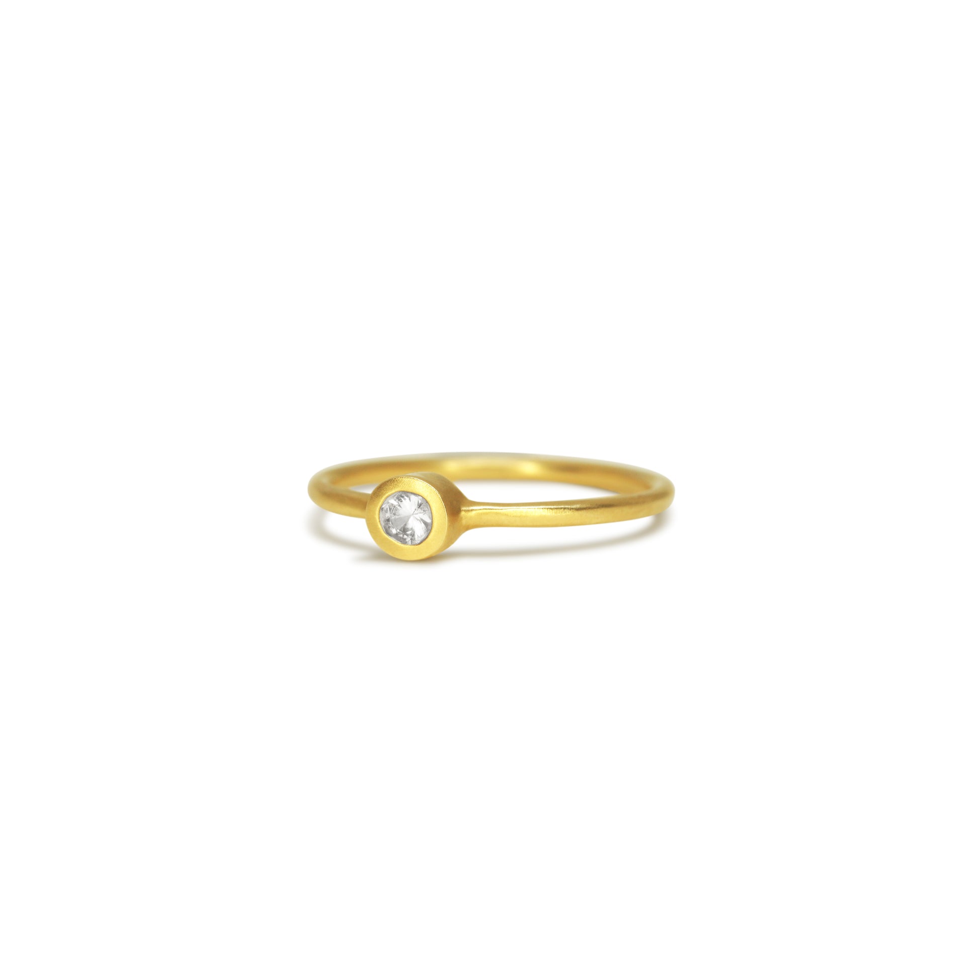 Details  Indulge in the timeless elegance of our Single Diamond Ring. This sparkling centerpiece features exquisite craftsmanship that will captivate your heart and dazzle on your finger. Elevate your style and make a statement with this stunning piece of jewelry.  3mm Round White Diamond Round Band 14k Yellow Gold Satin Finish WxT: 1.45mm
