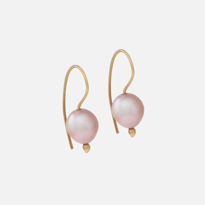 The SWAN PEARL EARRINGS offer an elegant and timeless design crafted with high-quality materials. With their versatile style, these earrings are perfect for both formal occasions and everyday wear. Elevate your look with these stunning and sophisticated accessories.  Two 7.7mm pink fresh water pearls 14k yellow gold Satin finish Each earring measures 21.07mm width by 7.88mm length Sold as a pair