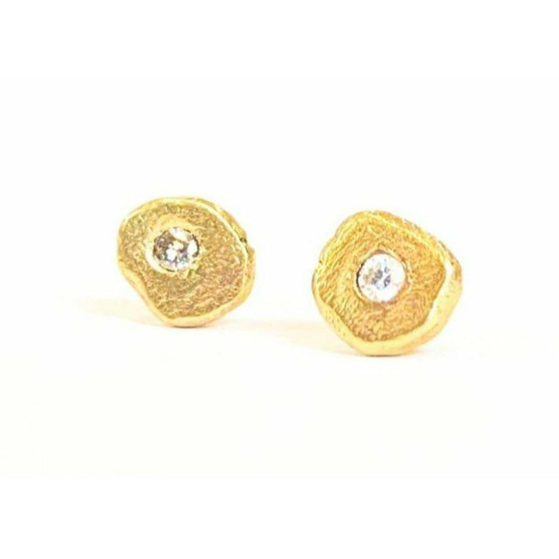 Details.  Add a touch of elegance and sophistication to your look with these stunning textured diamond stud earrings. The intricate textured design adds a unique twist to the classic diamond studs, creating a sparkling and glamorous accessory that will elevate any outfit.  1.8 mm pointer diamond flush set.  6mm-6.25  not a regular shape textured.  small butterfly back.
