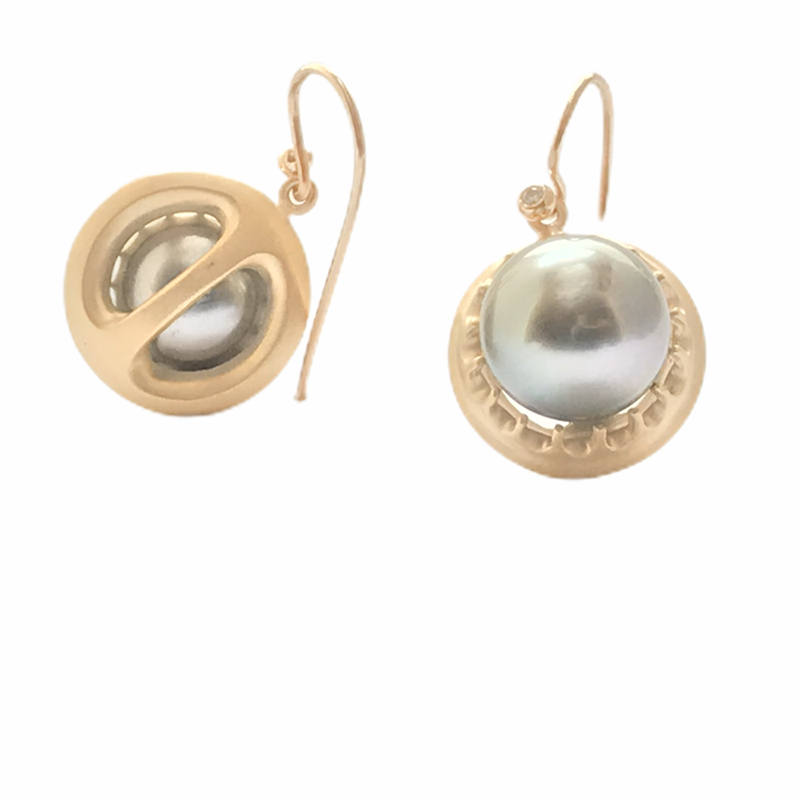 Introducing our exquisite Open Back Pearl Earrings, a timeless accessory that adds an elegant touch to any outfit. Crafted with precision and attention to detail, these earrings are perfect for both formal occasions and everyday wear. Elevate your style with the sophistication and beauty of our Open Back Pearl Earrings.I see right through you earrings.  Open back 15mm button Japanese pearls