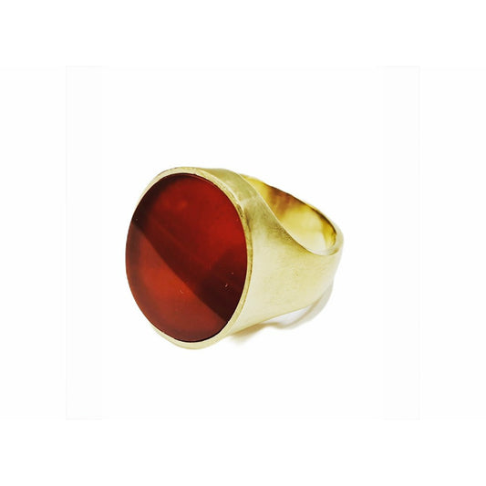 Indulge in the timeless elegance of our Regal Carnelian signet ring. Crafted with an exquisite design and featuring a genuine carnelian stone, this accessory exudes sophistication and style. Elevate your look and make a statement with this stunning piece of jewelry.