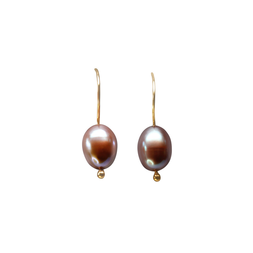 Details.   Indulge in timeless elegance with our 14k Classic Gold Pearl Earrings. Crafted with high-quality Handpicked pearls from Japan, these earrings exude sophistication and grace. 9mm freshwater Pearls.  Color Mauve   HandMade wire. 