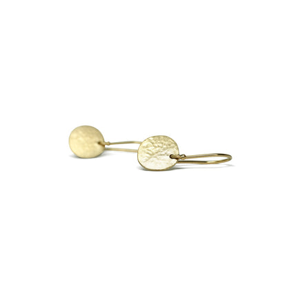 Complete your trendy and chic look with these stylish Small Sidewalk Disk Earrings. Made with high-quality materials, these earrings are the perfect accessory to elevate any outfit. Light and easy everyday charmers.  Handmade ear wires adorning a simple disk.  10mm disk.