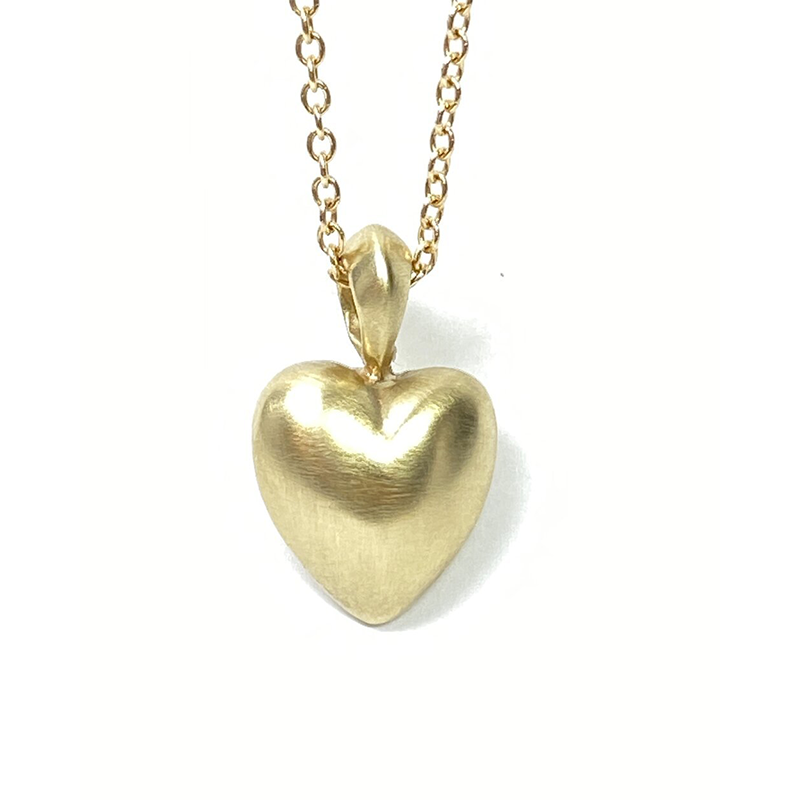 Keep your loved ones close to your heart with our cremation moon necklace. Crafted with care, this necklace allows you to carry a small portion of their ashes, providing comfort and a constant reminder of their presence.  Details  -1 inch from the top of the bail to the edge of the heart, so it has a great weight to the Gold or Silver.  -1/2 inch wide stones can be also set, for example a birthstone of your loved one or even personal engraving.
