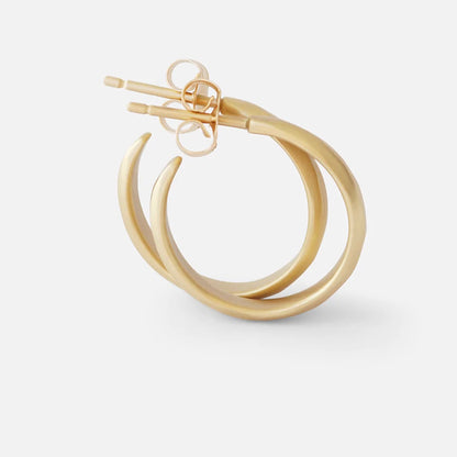  Textured Hoops, featuring intricate designs and a touch of elegance,comfortable and light enough for everyday. 14k Yellow Gold Satin Finish HxW: 16.18mm x 2.65mm