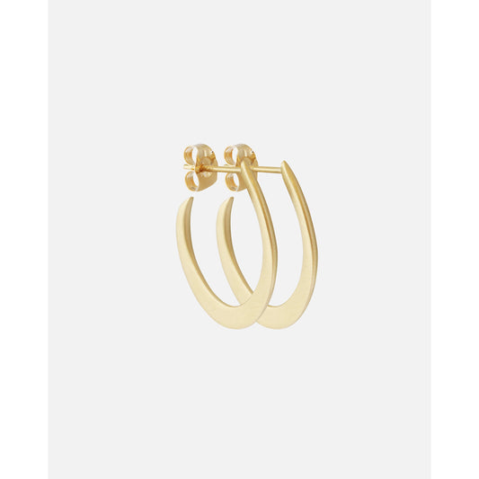 Introducing TUSK / HOOPS, the perfect addition to your jewelry collection. These open hoop earrings are sleek, elegant, and versatile, making them the ideal accessory for any occasion. Elevate your style with TUSK / HOOPS - shop now and make a statement with these stunning earrings. 14k Yellow Gold Satin Finish HxW: 21.50mm x 1mm