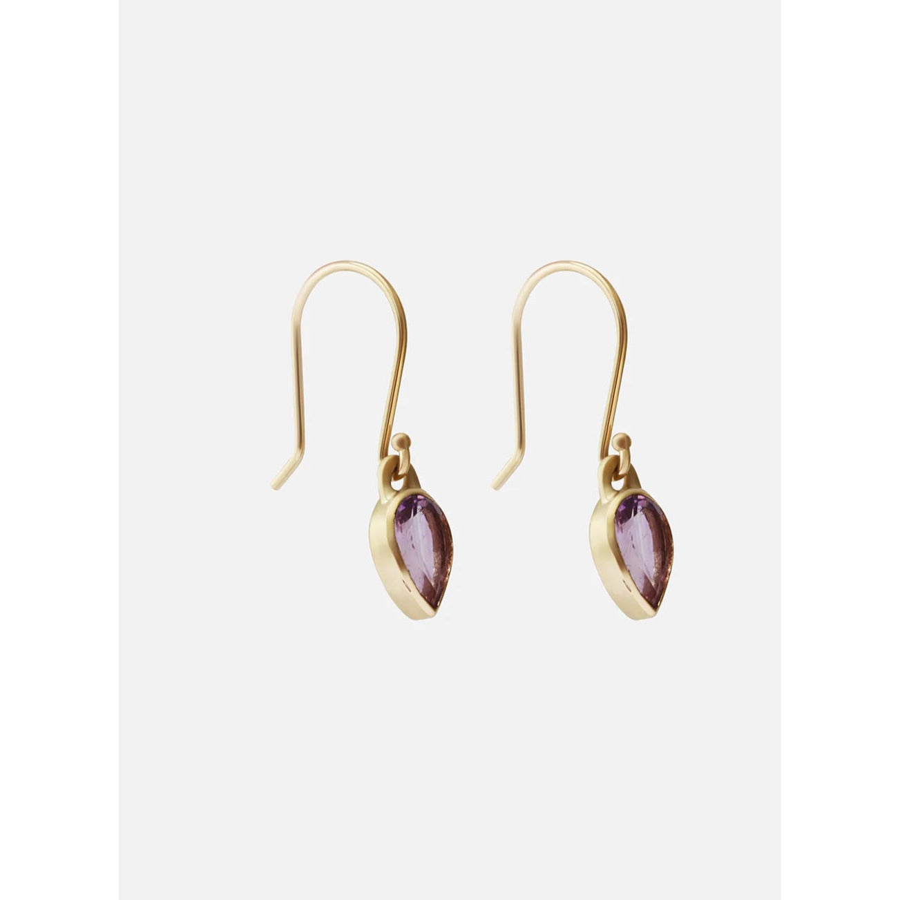 Details.  Indulge in the timeless elegance of these single amethyst earrings. The stunning amethyst stones are beautifully showcased in an elegant and sophisticated design. Elevate any outfit with these exquisite earrings - a must-have addition to your jewelry collection. Tear shaped Amethysts Stone  HxW: 20.79mm x 5.44mm 14k Yellow Gold Each earring measures 6.83mm  x 4.69mm