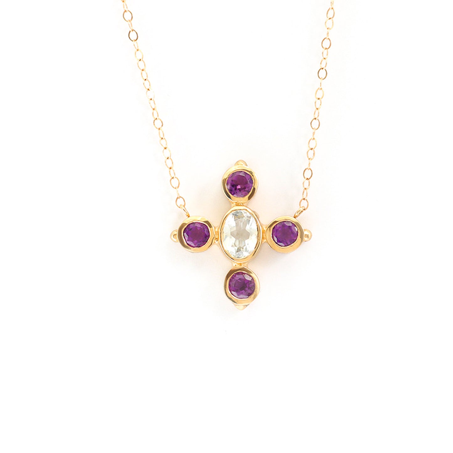 Elevate your style with this exquisite Amethyst Aquamarine necklace. Crafted with stunning gemstones and an elegant design, this necklace is the perfect accessory to add a touch of sophistication to any outfit.     14k yellow gold, white gold or rose gold 1 X 6mm aquamarine oval gemstone 4 X 4mm amethyst round gemstone 18-inch round chain with a 16-inch spacer
