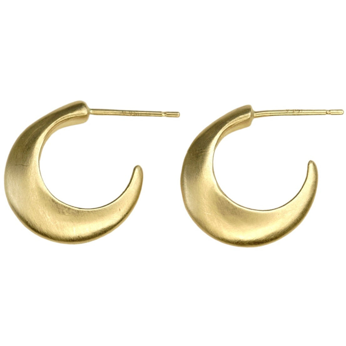 Step up your earring game with our Small Half Moon Hoops. With their versatile design, these hoops are perfect for any occasion. Easy to wear and a classic style. 14k Yellow Gold Satin Finish HxW: 14.04mm x 3.37mm