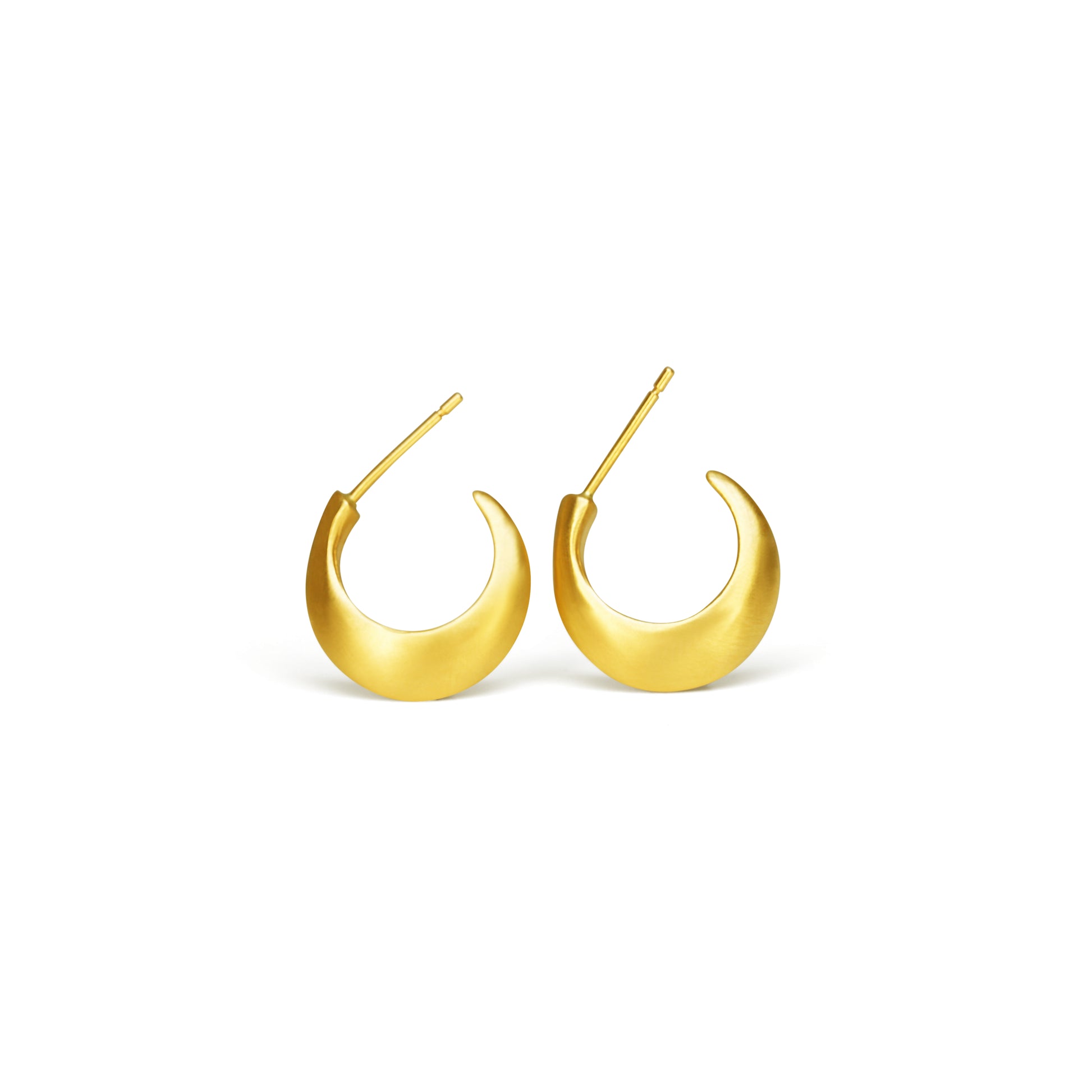 Step up your earring game with our Small Half Moon Hoops. With their versatile design, these hoops are perfect for any occasion. Easy to wear and a classic style. 14k Yellow Gold Satin Finish HxW: 14.04mm x 3.37mm