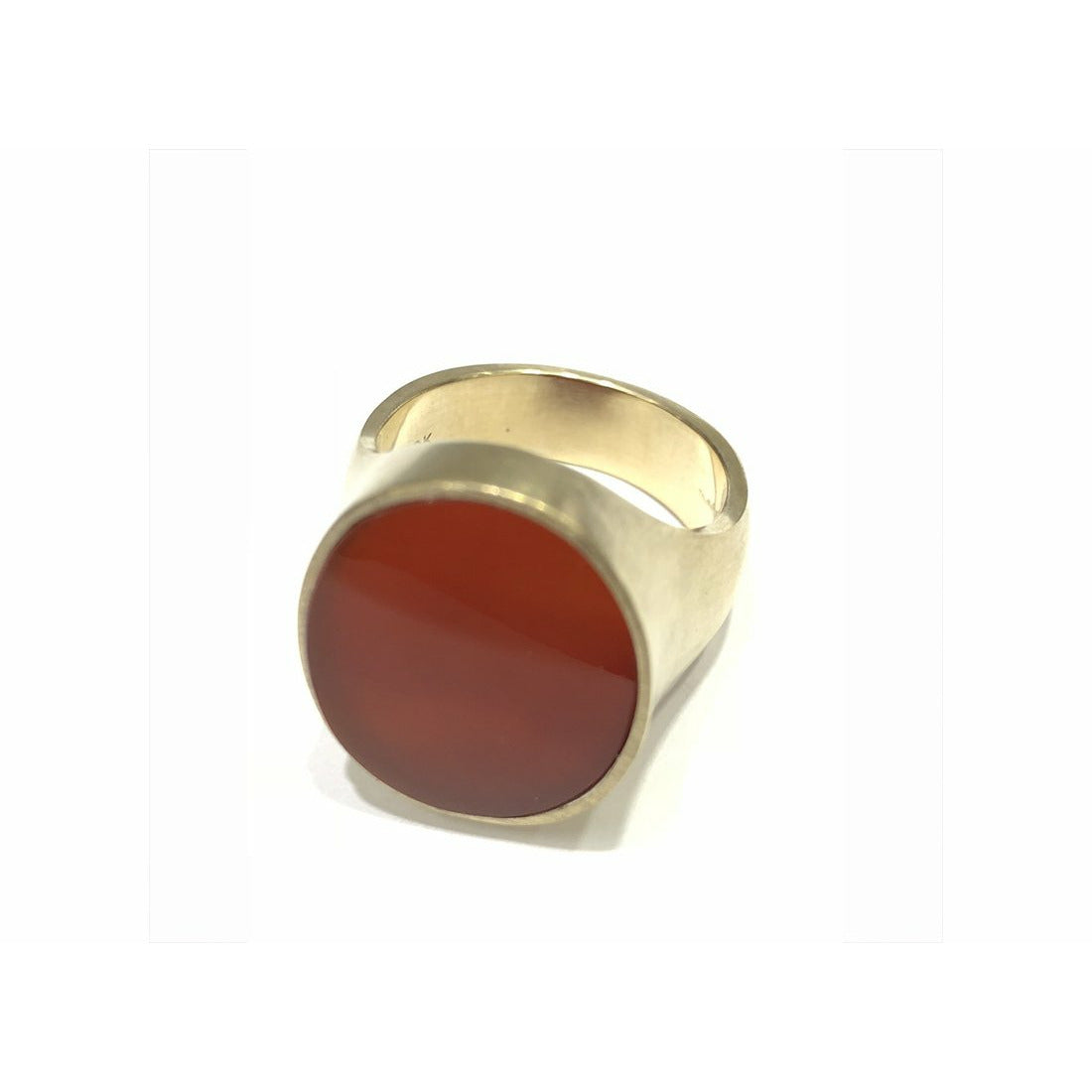 Indulge in the timeless elegance of our Regal Carnelian signet ring. Crafted with an exquisite design and featuring a genuine carnelian stone, this accessory exudes sophistication and style. Elevate your look and make a statement with this stunning piece of jewelry.