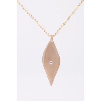 Enhance your jewelry collection with this elegant drop leaf necklace. The versatile design and sparkling diamond accent make it a perfect accessory for any occasion. Add a touch of sophistication to your look with this exquisite piece.  1 pointer diamond.  16 inch chain